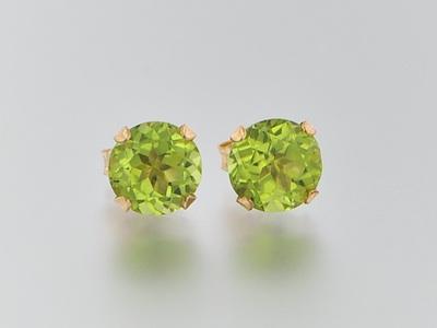 Appraisal: A Pair of Peridot Earrings k yellow gold ear studs