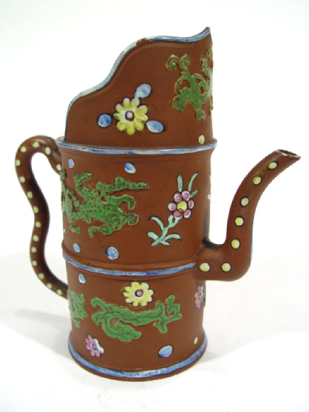 Appraisal: Chinese simulated bamboo terracotta teapot enamelled with dragons and flowers