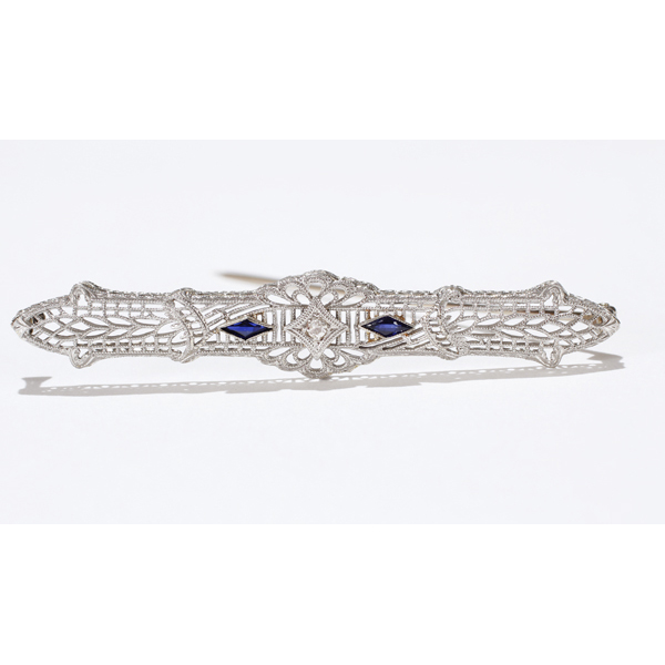 Appraisal: White gold K filigree diamond sapphire pin dwt W