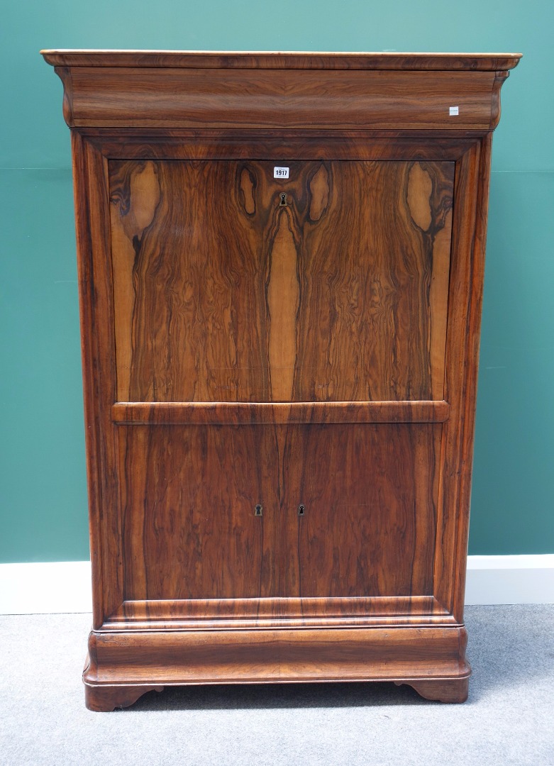 Appraisal: A th century figured walnut secretaire a abattant the cushion