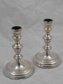 Appraisal: A pair of hallmarked silver candlesticks London approx cm high