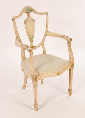 Appraisal: An Edwardian white painted open armchair with shield shape back