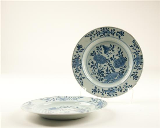 Appraisal: A Pair of Kangxi Deep Porcelain Plates blue and white