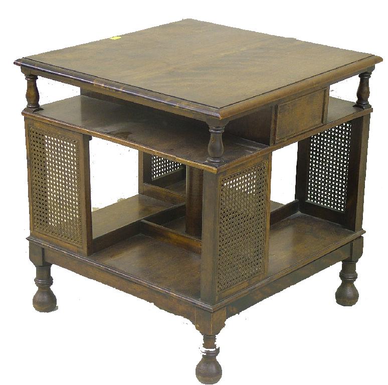 Appraisal: Square revolving low occasional table bookcase inset with a small