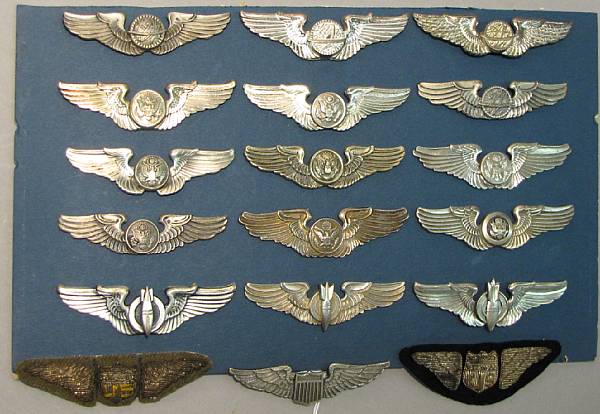 Appraisal: A group of aviator's wings military badges Including three embroidered