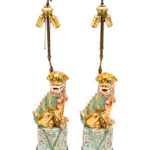 Appraisal: A Pair of Chinese Porcelain Lamps th Century a pair