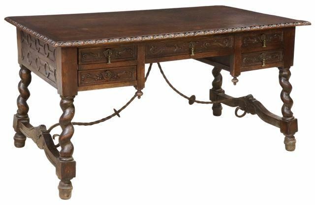 Appraisal: Spanish Renaissance Revival oak writing desk early th c rectangular