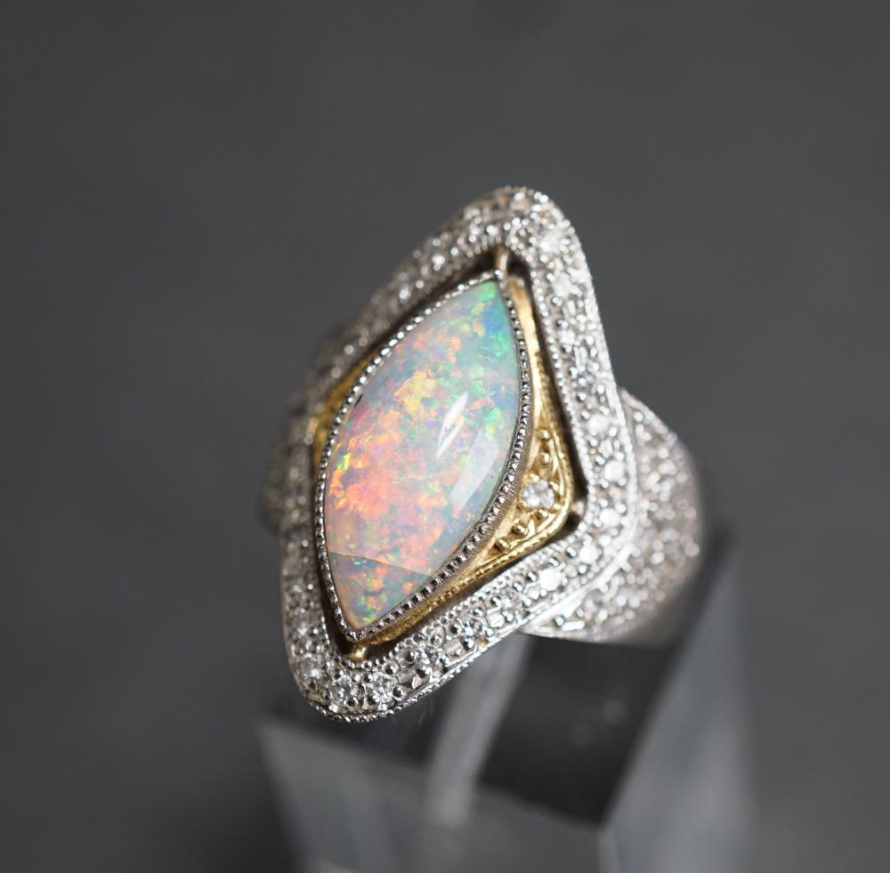 Appraisal: PLATINUM -KARAT YELLOW-GOLD OPAL AND DIAMOND RING GROSS DWT SIZE