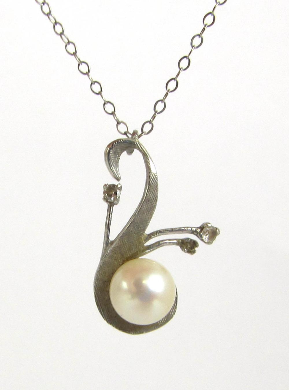 Appraisal: PEARL AND FOURTEEN KARAT GOLD PENDANT NECKLACE with a k