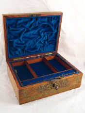 Appraisal: A Victorian rosewood jewellery box with lock and key brass