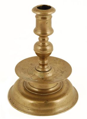 Appraisal: A th century bronze 'low bell' candlestick with a turned