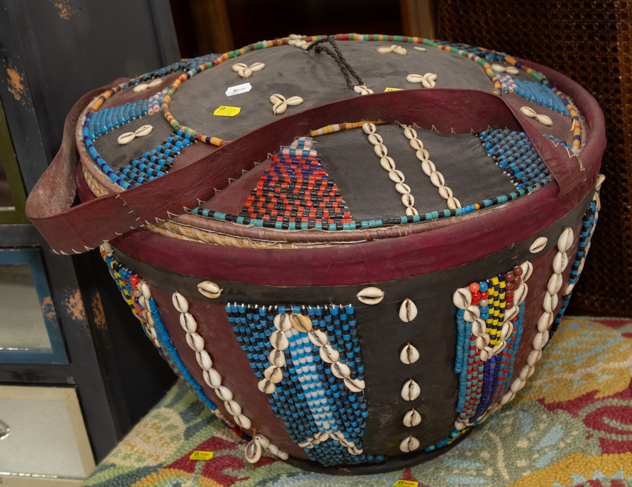 Appraisal: HAUSA BASKET WITH LEATHER BEADWORK Northern Nigeria late th century