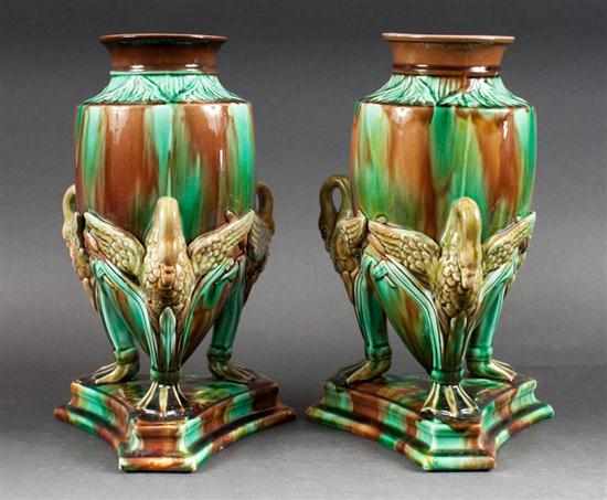 Appraisal: Pair of English majolica trifid base figural urns unmarked late