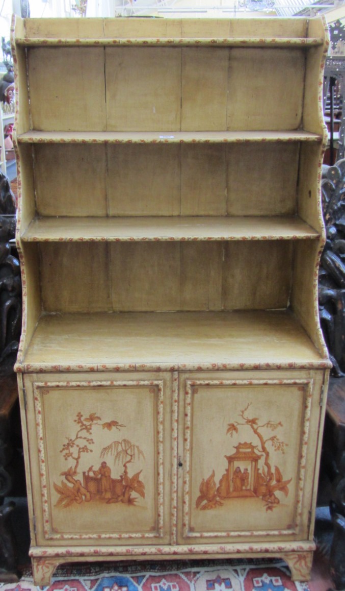 Appraisal: A th century polychrome painted three tier waterfall bookcase with