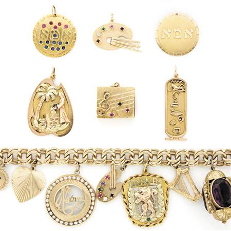 Appraisal: Gold and Colored Stone Charm Bracelet and Six Loose Charms