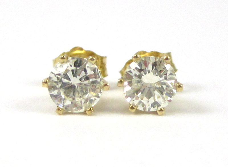 Appraisal: PAIR OF DIAMOND EAR STUDS each k yellow gold set