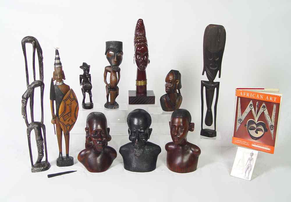 Appraisal: COLLECTION OF AFRICAN ART BOOKS SCULPTURES To include carved wood