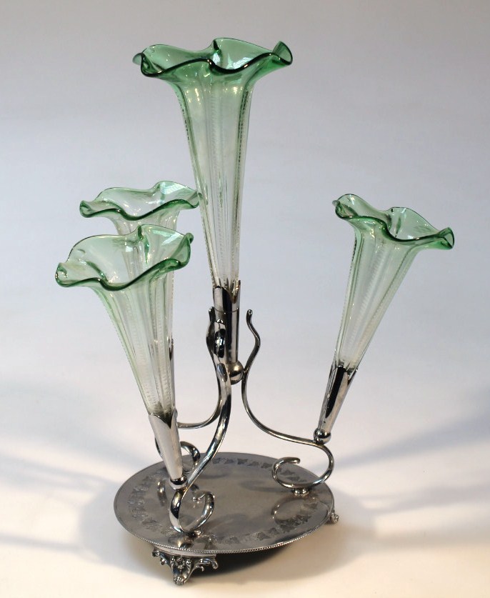 Appraisal: An early thC chrome plated and glass epergne set with