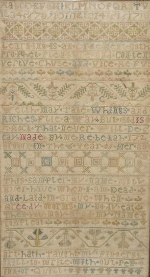 Appraisal: A GEORGE I NEEDLEWORK SAMPLER by Rebekah Brown aged worked