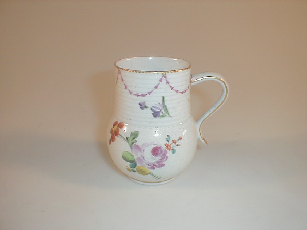 Appraisal: A Derby porcelain pot belly mug with ribbed neck loop