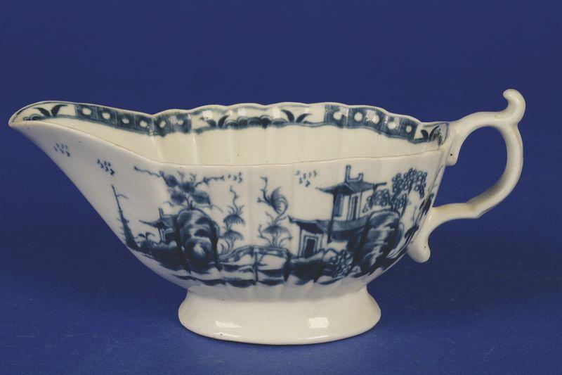 Appraisal: A FIRST PERIOD WORCESTER BLUE AND WHITE SAUCEBOAT circa decorated