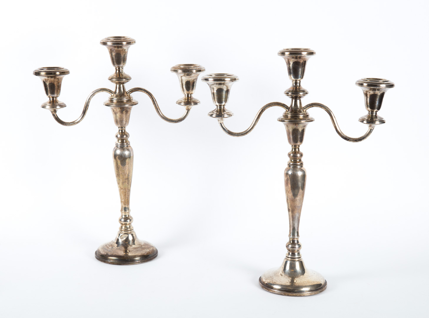 Appraisal: Pair of Revere weighted sterling silver candelabra in H Condition