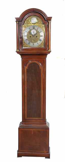 Appraisal: A MAHOGANY EIGHT DAY LONGCASE CLOCK the brass break arch