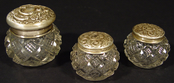 Appraisal: Cut glass silver lidded pot and a pair of similar