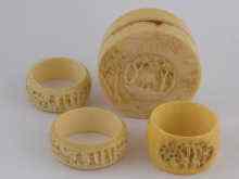 Appraisal: Ivory A carved ivory pot cm diameter and three napkin