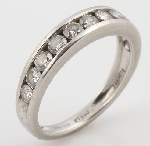 Appraisal: Platinum anniversary-type band - mm channel set round diamonds approximately