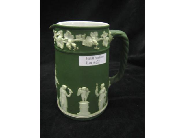 Appraisal: Wedgwood Dark Green Jasperware Milk Pitcher classical maidens cupid in