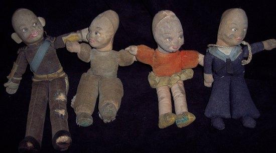 Appraisal: A cloth doll sailor and three others