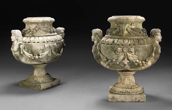 Appraisal: A pair of Neoclassical style carved marble garden urns late