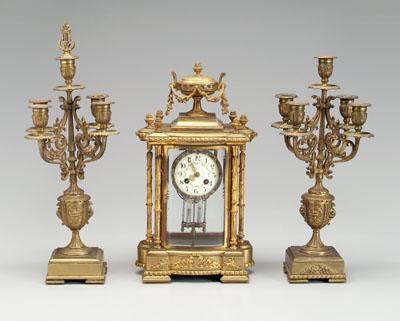 Appraisal: French clock and garniture bronze dore key-wind clock urn pediment