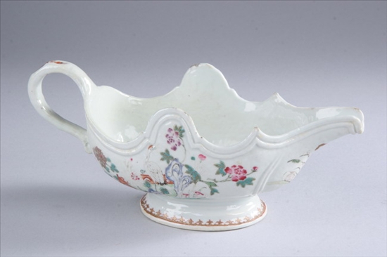 Appraisal: CHINESE EXPORT FAMILLE ROSE PORCELAIN FOOTED SAUCEBOAT Circa Shaped top