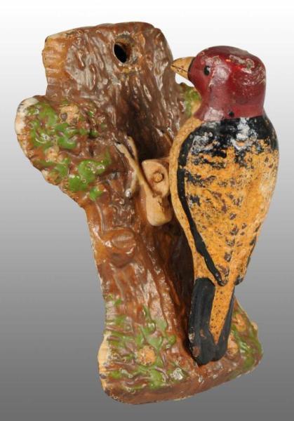 Appraisal: Cast Iron Woodpecker Doorknocker Description Made by Hubley Numbered Condition