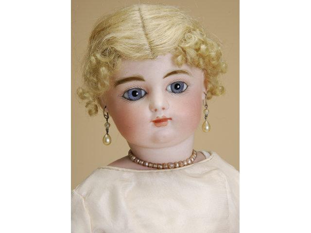 Appraisal: Rabery Delphieu Bebe France ca pale pressed bisque socket head