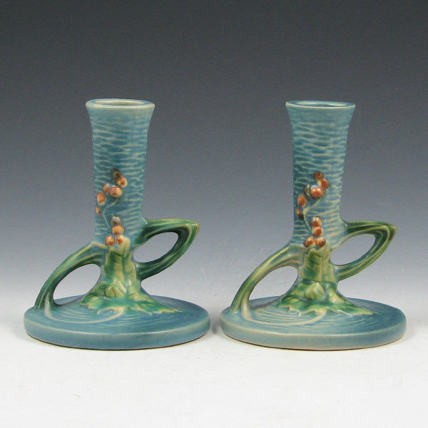 Appraisal: Roseville Bushberry - Candleholders Pr Pair of blue Roseville Bushberry