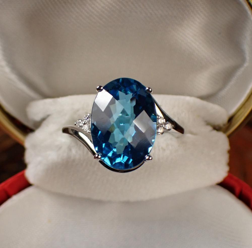 Appraisal: BLUE TOPAZ DIAMOND AND FOURTEEN KARAT GOLD RING The k