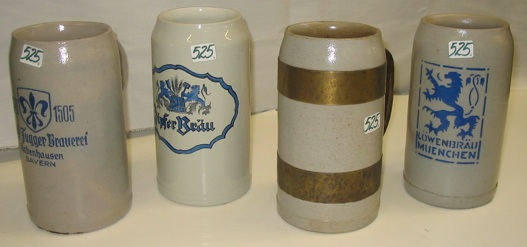 Appraisal: A GROUP OF FOUR GERMAN STONEWARE ADVERTISING STEINS in L