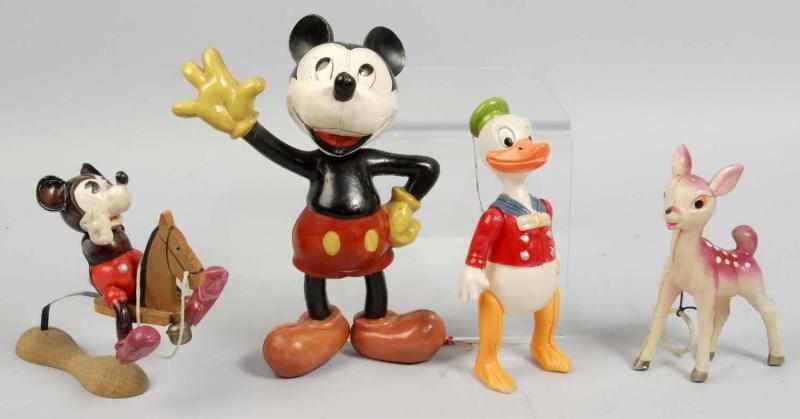 Appraisal: Lot of Celluloid Disney Character Figures Description Includes two Mickey