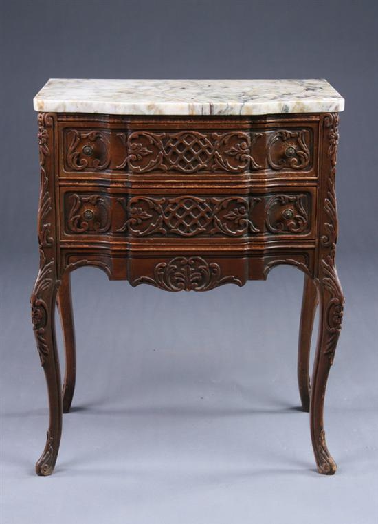 Appraisal: FRENCH PROVINCIAL MARBLE-TOP COMMODE th century oak Of breakfront form