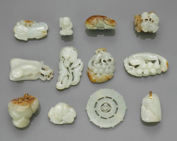 Appraisal: A group of twelve carved jade decorations Late Qing Republic