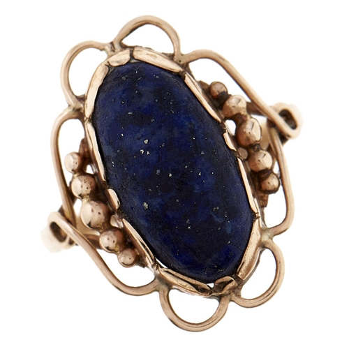 Appraisal: A lapis lazuli ring in gold g size K More