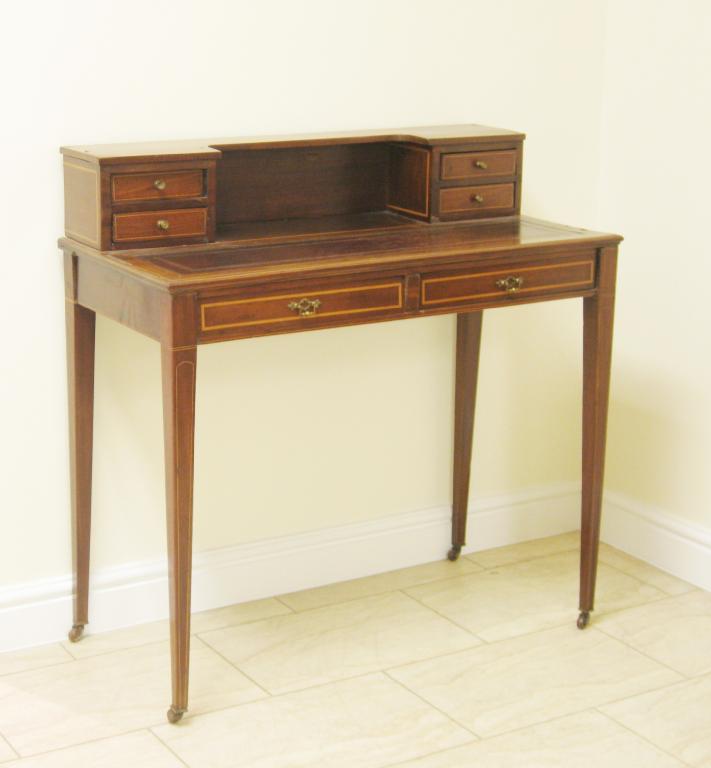 Appraisal: An Edwardian mahogany Bonheur Du Jour with raised back fitted