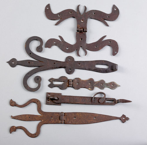 Appraisal: Two decorative wrought iron hinges late th early th c