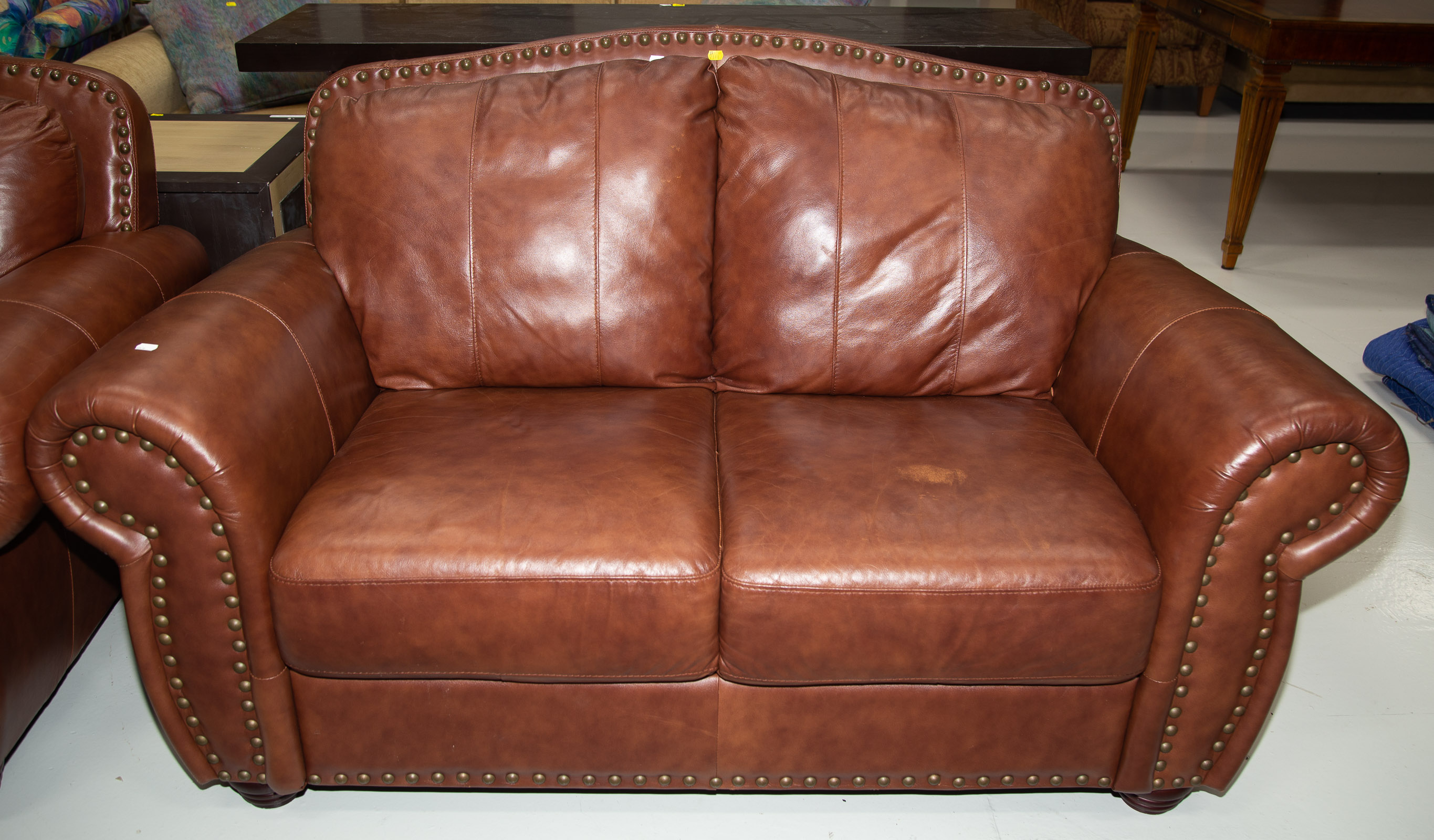 Appraisal: LEATHER LOVE SEAT Late th century in H