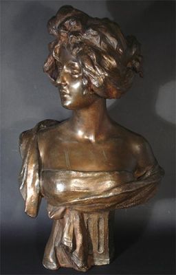 Appraisal: A large patinated spelter bust of a maiden cast from