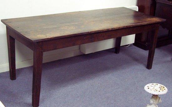 Appraisal: A th Century oak table the planked top above square