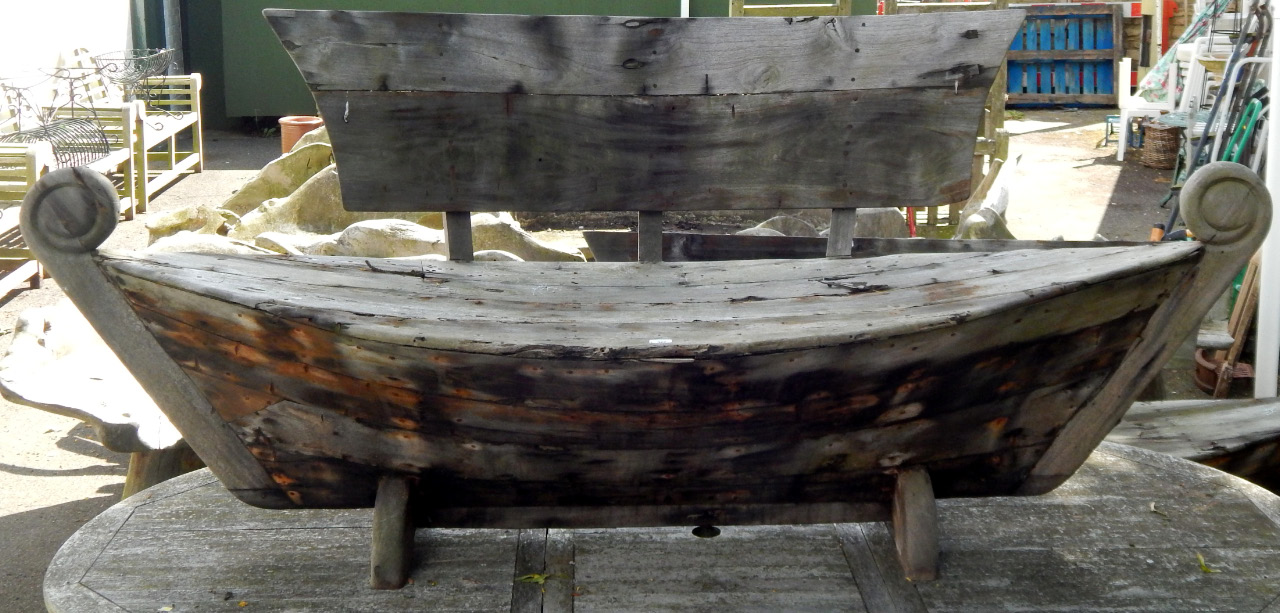 Appraisal: A galley type wooden garden bench cm long